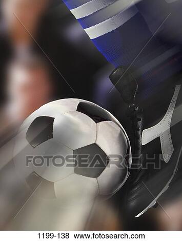Stock Photo - ball, motion, sports, speed, foot, power, powerful. Fotosearch