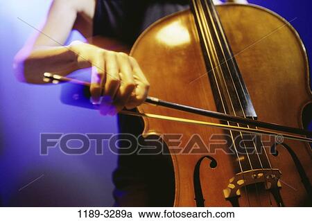 blur, woman, playing, music, arts, entertainment View Large Photo Image Stock Image - blur, woman, playing, music, arts, entertainment. Fotosearch