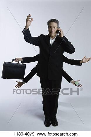 briefcase, phone, business, Middle-aged, cell phone, multi-tasking View Large Photo Image Stock Photo - briefcase, phone, business, Middle-aged, cell phone, multi-tasking. Fotosearch