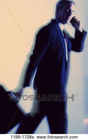 briefcase, talking, conversation, phone, businessman, cell, Caucasian View Large Photo Image Stock Image - briefcase, talking, conversation, phone, businessman, cell, Caucasian. Fotosearch