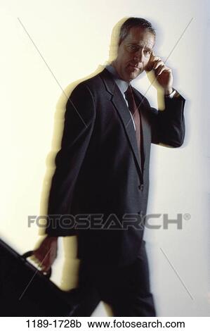 briefcase, talking, conversation, phone, cell, aged View Large Photo Image Stock Image - briefcase, talking, conversation, phone, cell, aged. Fotosearch