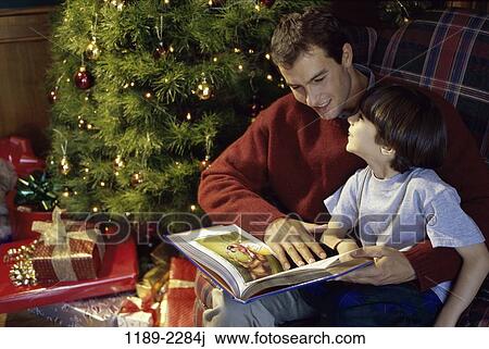 Stock Image - Christmas, family, holiday, Christmas families. Fotosearch