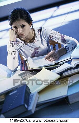 classroom, people, books, listening, desk, notebook, attentive View Large Photo Image Stock Image - classroom, people, books, listening, desk, notebook, attentive. Fotosearch