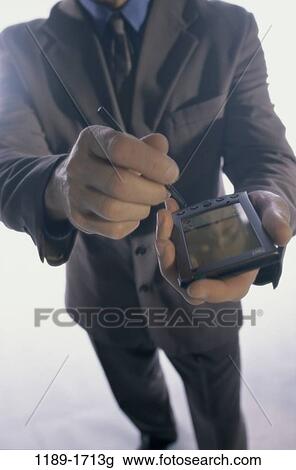computer, business, businessman, PDA, handheld, palmtop View Large Photo Image Stock Image - computer, business, businessman, PDA, handheld, palmtop. Fotosearch