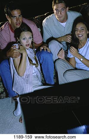 dark, people, watch, entertainment, watching, television, anticipation View Large Photo Image Stock Photo - dark, people, watch, entertainment, watching, television, anticipation. Fotosearch