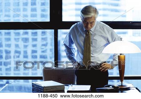 desk, Asian, window, senior, reading, business View Large Photo Image Stock Image - desk, Asian, window, senior, reading, business. Fotosearch