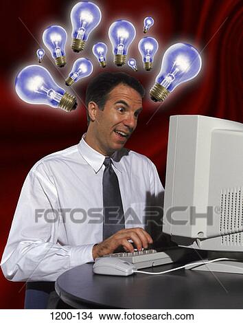 Picture - desk, computer, typing, achievement, Middle-aged, contemplation. Fotosearch
