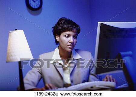 desk, woman, computer, concentrating, worker, business, looking View Large Photo Image Stock Image - desk, woman, computer, concentrating, worker, business, looking. Fotosearch