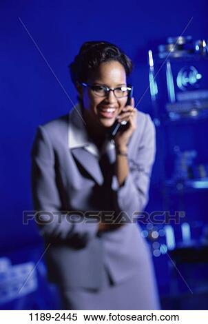 desk, woman, smiling, telephone, talking, eyeglasses, phone View Large Photo Image Stock Photography - desk, woman, smiling, telephone, talking, eyeglasses, phone. Fotosearch
