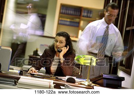 desk, woman, telephone, talking, eyeglasses, Hispanic, phone View Large Photo Image Stock Image - desk, woman, telephone, talking, eyeglasses, Hispanic, phone. Fotosearch