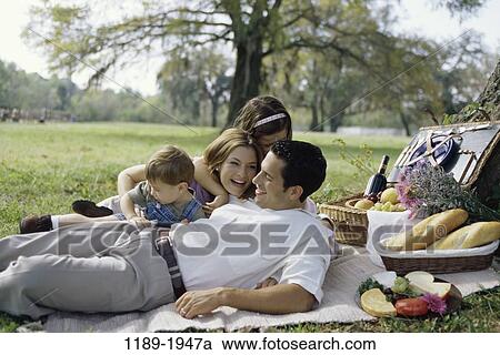Field, people, picnic, laughing, outdoors, family View Large Photo Image Stock Image - Field, people, picnic, laughing, outdoors, family. Fotosearch