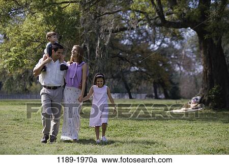Field, people, smiling, walking, holding, trees View Large Photo Image Stock Image - Field, people, smiling, walking, holding, trees. Fotosearch