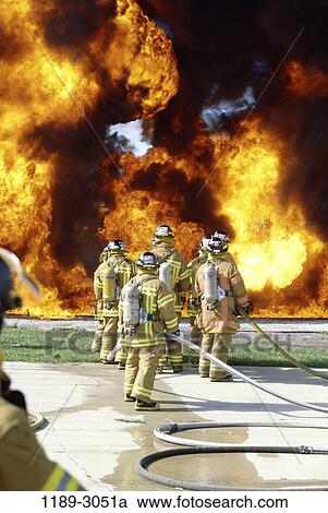fire, danger, people, smoke, outdoors, teamwork, flames View Large Photo Image Stock Image - fire, danger, people, smoke, outdoors, teamwork, flames. Fotosearch