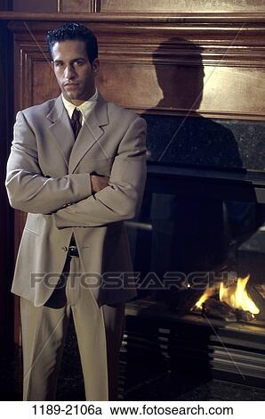 fire, people, suit, Hispanic, fireplace, standing View Large Photo Image Stock Image - fire, people, suit, Hispanic, fireplace, standing. Fotosearch