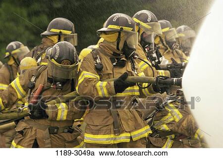 fire, spraying, teamwork, spray, hose, occupation View Large Photo Image Stock Image - fire, spraying, teamwork, spray, hose, occupation. Fotosearch