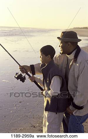 fish, people, beach, fishing, family, father View Large Photo Image Stock Image - fish, people, beach, fishing, family, father. Fotosearch