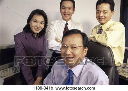 Stock Image - group, Asian, business, portrait, indoors, businesspeople, Businesspeople various. Fotosearch