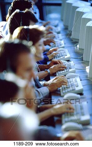 group, desk, telephone, phone, business, computers, headphones View Large Photo Image Stock Photo - group, desk, telephone, phone, business, computers, headphones. Fotosearch