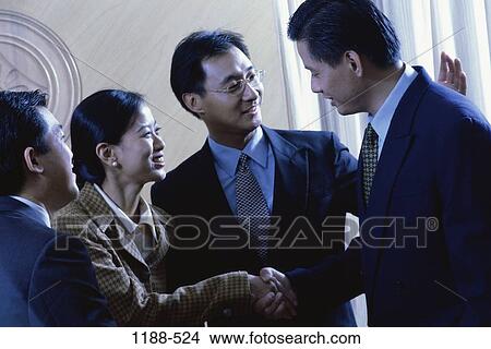 Picture - group, hands, Asian, deal, gesturing, business. Fotosearch
