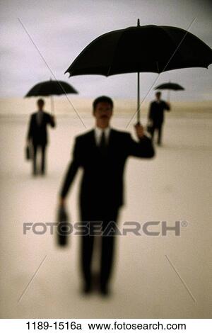 group, men, blur, desert, outdoors, umbrellas, serious View Large Photo Image Stock Image - group, men, blur, desert, outdoors, umbrellas, serious. Fotosearch