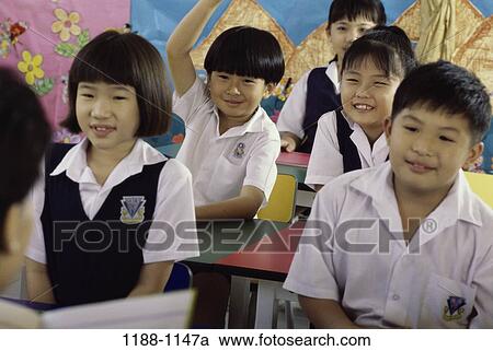 group, people, Asian, teacher, listening, school, classroom View Large Photo Image Stock Image - group, people, Asian, teacher, listening, school, classroom. Fotosearch