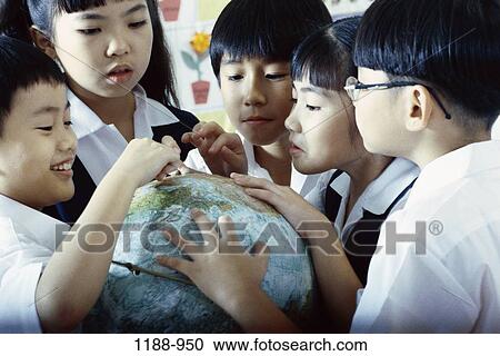 Stock Image - group, people, globe, Asian, pointing, education, students. Fotosearch