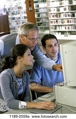 group, people, teacher, school, computer, library, research View Large Photo Image Stock Image - group, people, teacher, school, computer, library, research. Fotosearch