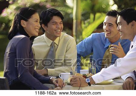 group, smiling, Asian, conversation, drinking, business View Large Photo Image Stock Image - group, smiling, Asian, conversation, drinking, business. Fotosearch