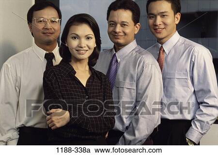 group, smiling, coworkers, Asian, standing, business View Large Photo Image Stock Image - group, smiling, coworkers, Asian, standing, business. Fotosearch