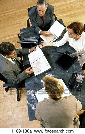 groups, table, discussion, choices, reading, phone, gesturing View Large Photo Image Stock Image - groups, table, discussion, choices, reading, phone, gesturing. Fotosearch