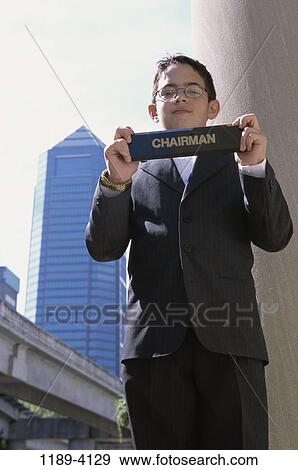 holding, boy, business, outdoors, sign, child, proud View Large Photo Image Stock Photo - holding, boy, business, outdoors, sign, child, proud. Fotosearch