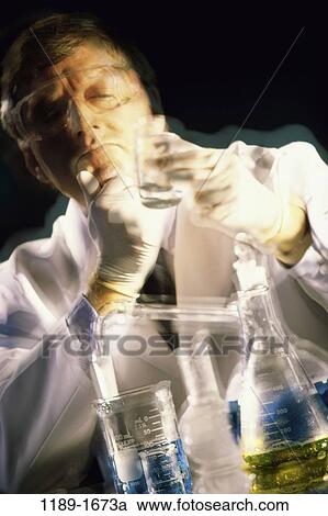 Stock Image - industry, scientist, research, Middle-aged, thinking, lab. Fotosearch