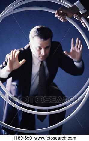 jump, jumping, business, trapped, businessman, jumping through hoop View Large Photo Image Stock Image - jump, jumping, business, trapped, businessman, jumping through hoop. Fotosearch