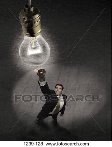 light, hanging, stretching, business, bulb, reaching View Large Photo Image Stock Photo - light, hanging, stretching, business, bulb, reaching. Fotosearch