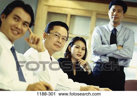 Stock Image - meeting, attentive, people, Asian, listening, business. Fotosearch