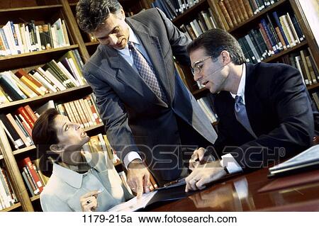 meeting, coworkers, talking, paperwork, discussion, papers View Large Photo Image Stock Image - meeting, coworkers, talking, paperwork, discussion, papers. Fotosearch