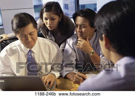 Stock Image - meeting, group, conference, business, businesspeople, Businesspeople conferring. Fotosearch