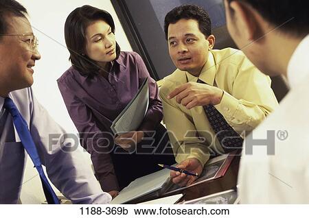 meeting, group, conference, business, businesspeople, Businesspeople conferring View Large Photo Image Stock Image - meeting, group, conference, business, businesspeople, Businesspeople conferring. Fotosearch