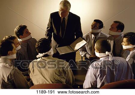 Stock Image - meeting, group, multiethnic, men, gagged, talking, listening. Fotosearch