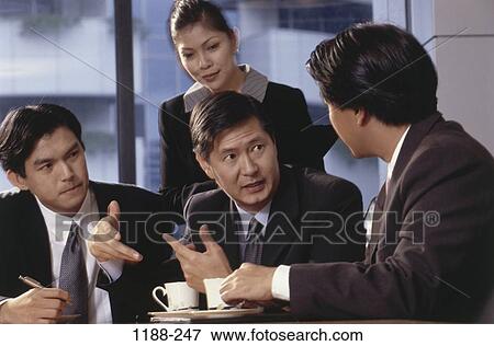 Stock Photo - meeting, group, talking, discussion, Asian, conversation, coffee. Fotosearch