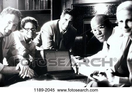 meeting, multiethnic, computer, laptop, business, using, indoors View Large Photo Image Stock Photography - meeting, multiethnic, computer, laptop, business, using, indoors. Fotosearch