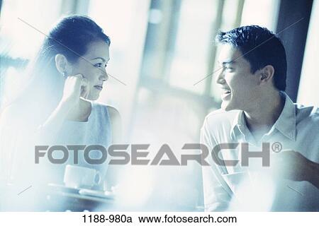Stock Image - meeting, people, talking, Asian, couple, coffee, drinking. Fotosearch