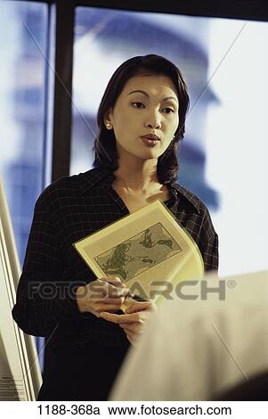 meeting, woman, talking, Asian, presentation, business, explaining View Large Photo Image Stock Image - meeting, woman, talking, Asian, presentation, business, explaining. Fotosearch
