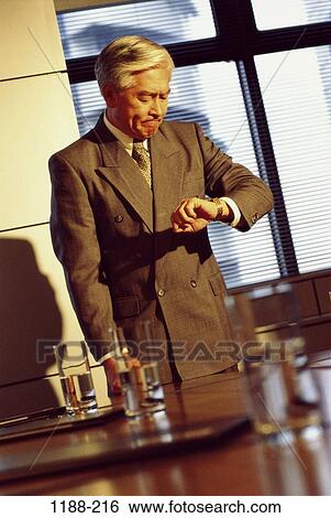 Stock Photograph - meetings, Asian, frustrated, business, senior, anger. Fotosearch