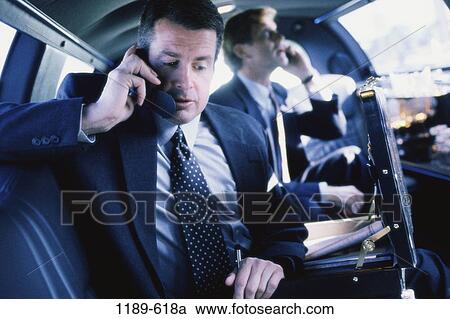 men, briefcase, limousine, talking, car, phone, business View Large Photo Image Stock Image - men, briefcase, limousine, talking, car, phone, business. Fotosearch
