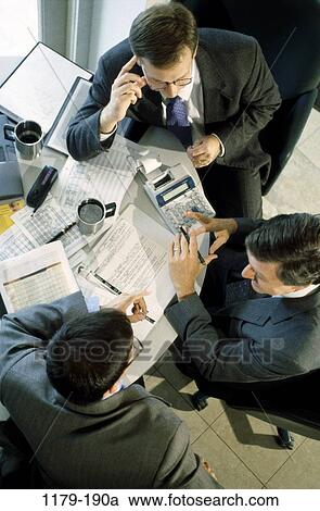 men, calculator, discussion, papers, coffee cup, gesturing, business View Large Photo Image Stock Image - men, calculator, discussion, papers, coffee cup, gesturing, business. Fotosearch