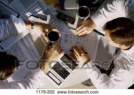 men, groups, overhead, pen, calculator, papers, coffee cup View Large Photo Image Stock Image - men, groups, overhead, pen, calculator, papers, coffee cup. Fotosearch
