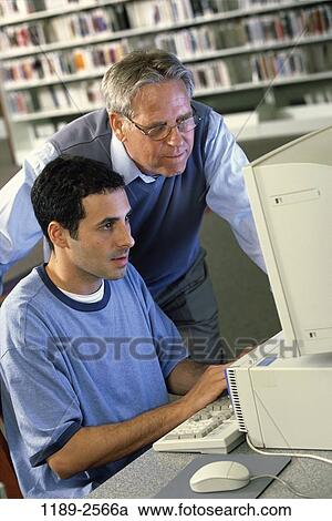 men, people, Hispanic, computer, library, teamwork, education View Large Photo Image Stock Image - men, people, Hispanic, computer, library, teamwork, education. Fotosearch