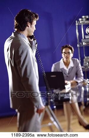 multiethnic, blur, desk, telephone, talking, sitting, computer View Large Photo Image Stock Image - multiethnic, blur, desk, telephone, talking, sitting, computer. Fotosearch