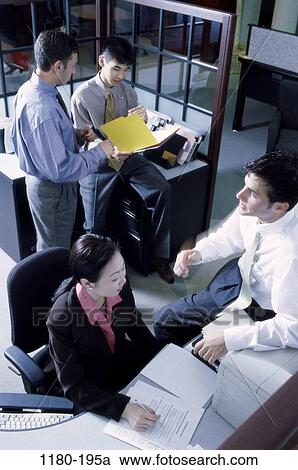 multiethnic, desk, business, concepts, executives, planning, indoors View Large Photo Image Stock Image - multiethnic, desk, business, concepts, executives, planning, indoors. Fotosearch
